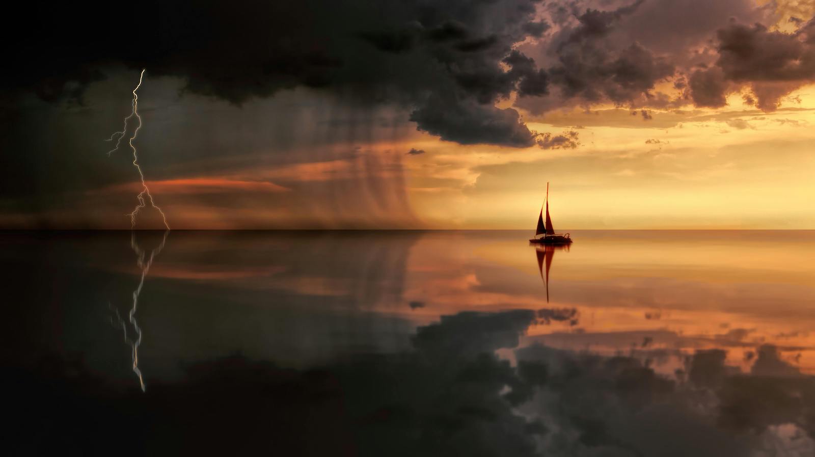 Silhouette Photography Of Boat On Water during a storm