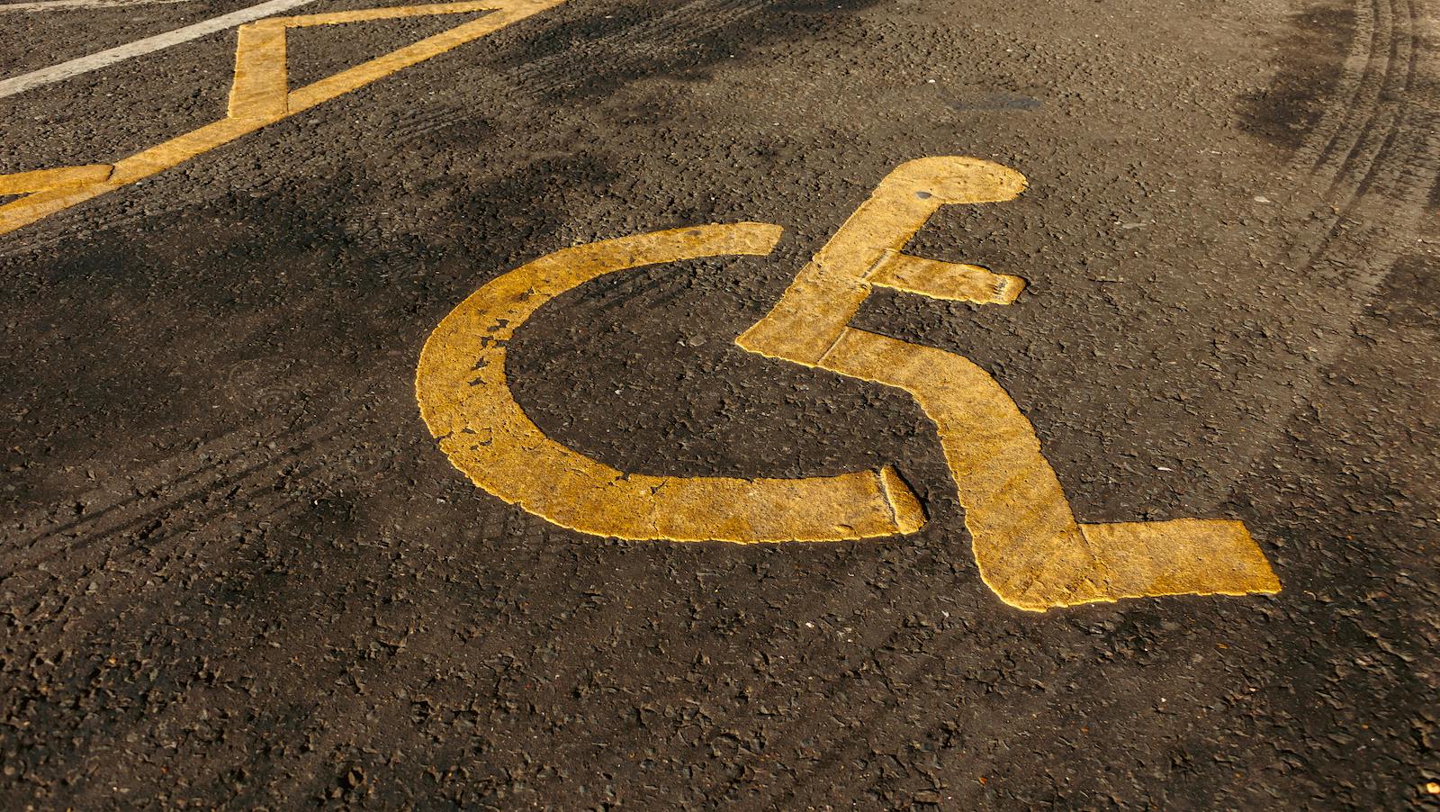 An International Access Symbol on Asphalt Road