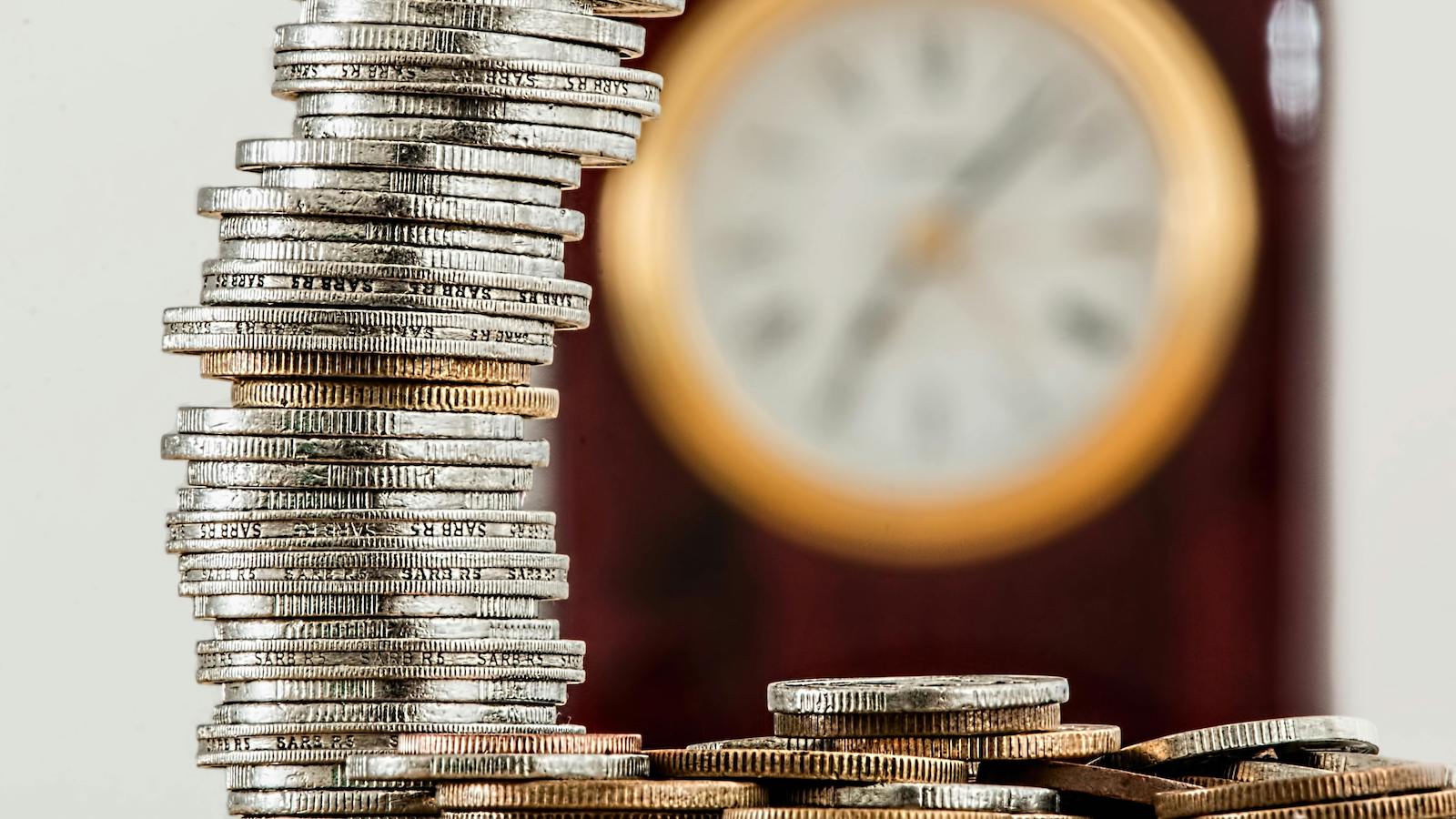 Selective Focus Photo of Stacked Coins