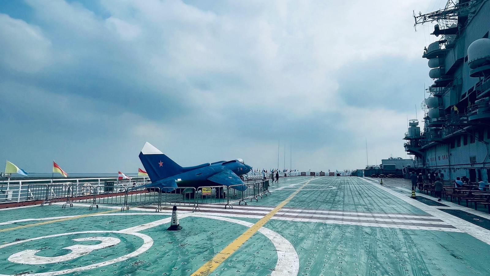 Blue Aircraft on Ship