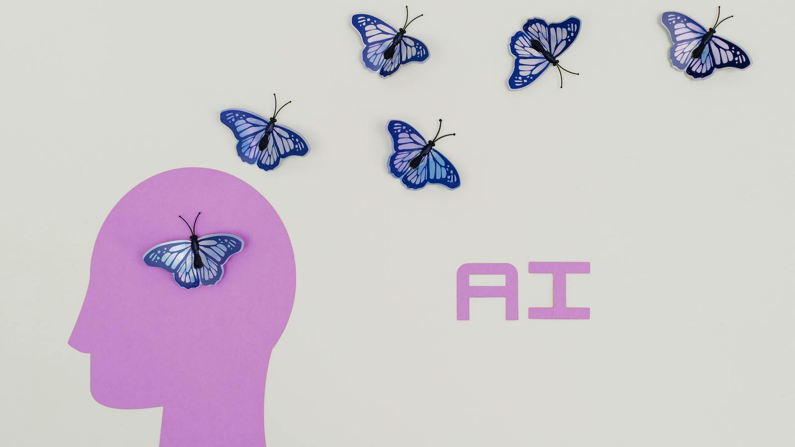 White and Blue Butterflies Illustration with text: AI