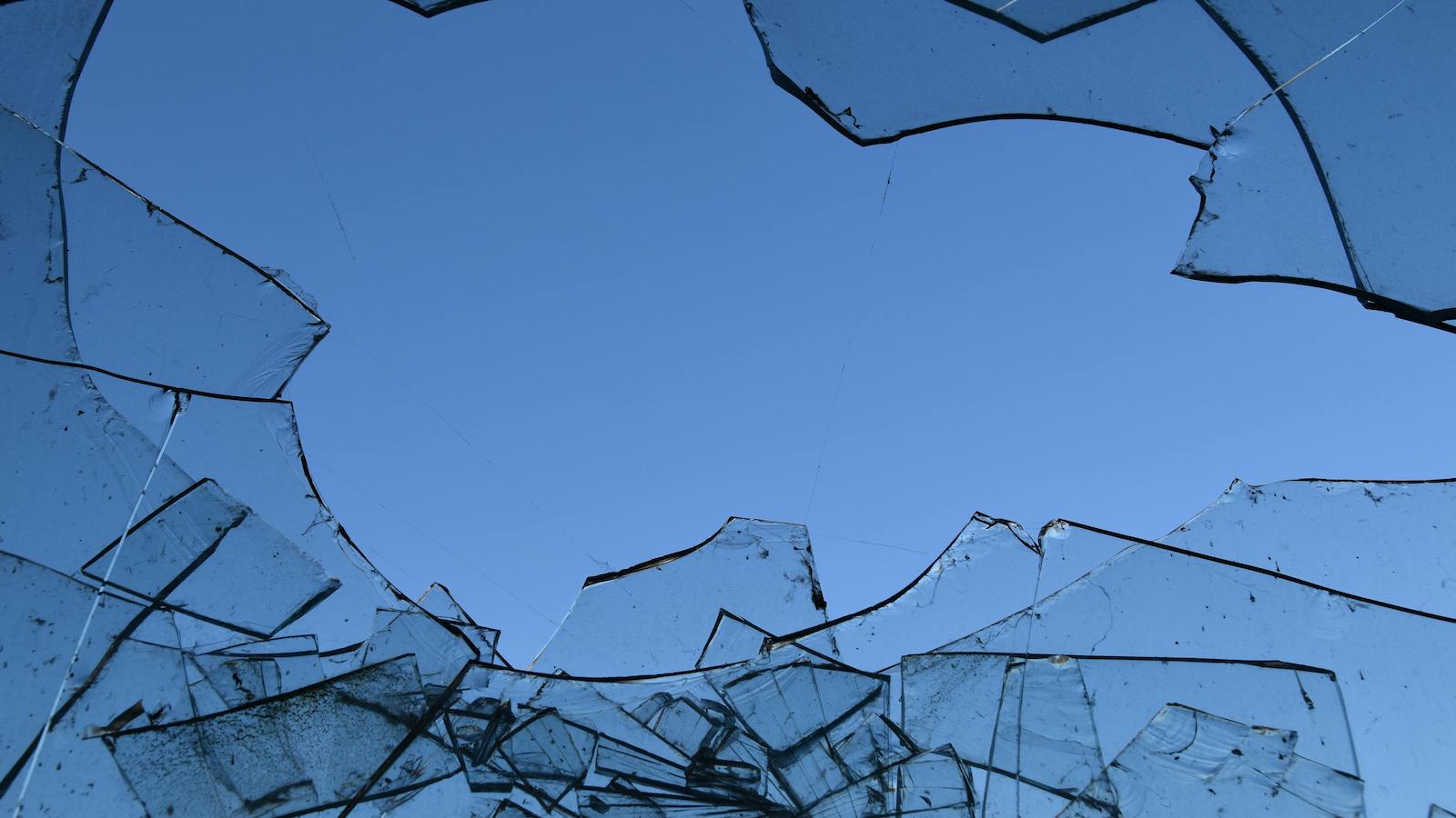 Shattered Glass Against Sky