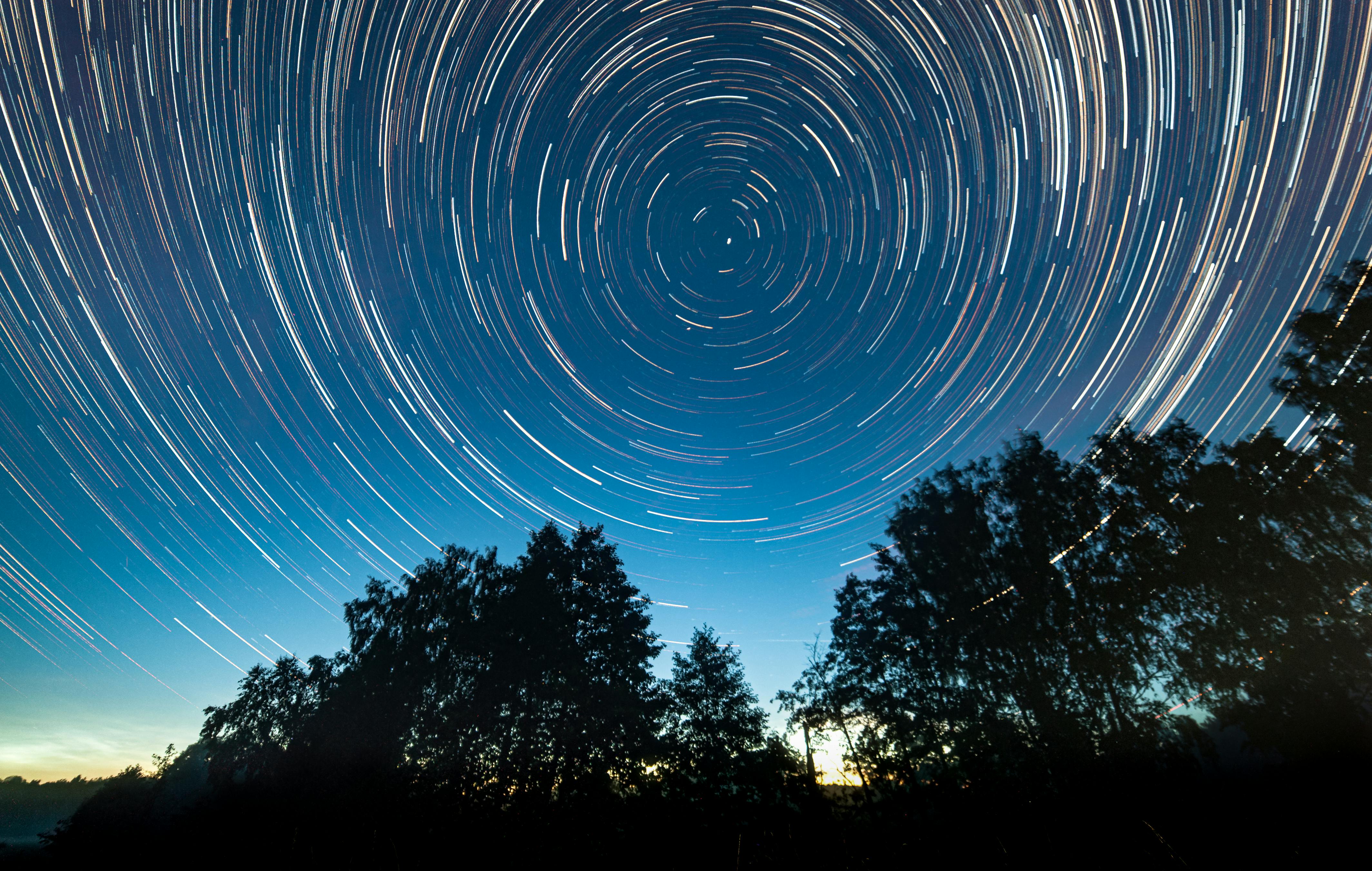 Time Lapse Photography of Stars in the Sky during Night Time