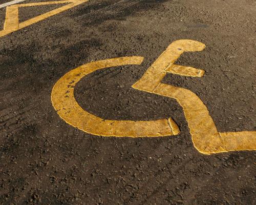 An International Access Symbol on Asphalt Road