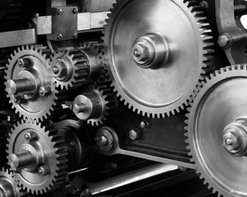 Gray Scale Photo of Gears