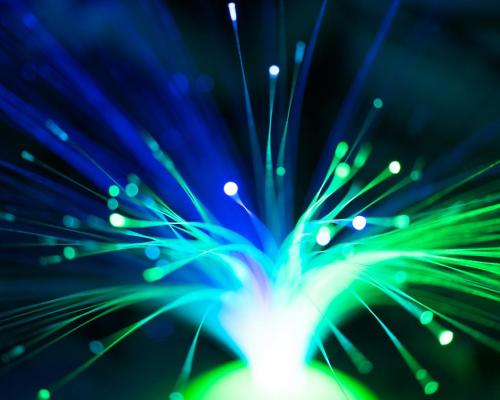 Close-Up Shot of a Green and Blue Fiber Optic