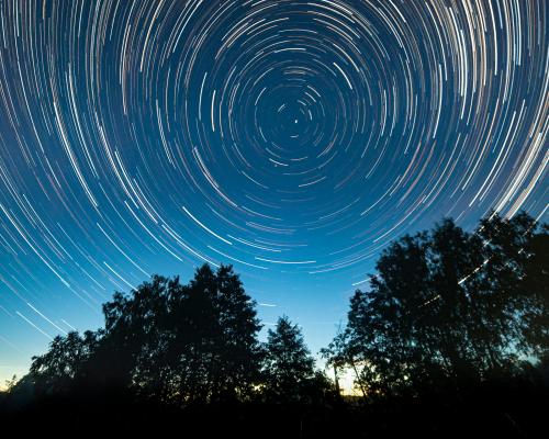 Time Lapse Photography of Stars in the Sky during Night Time