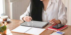 woman using ipad